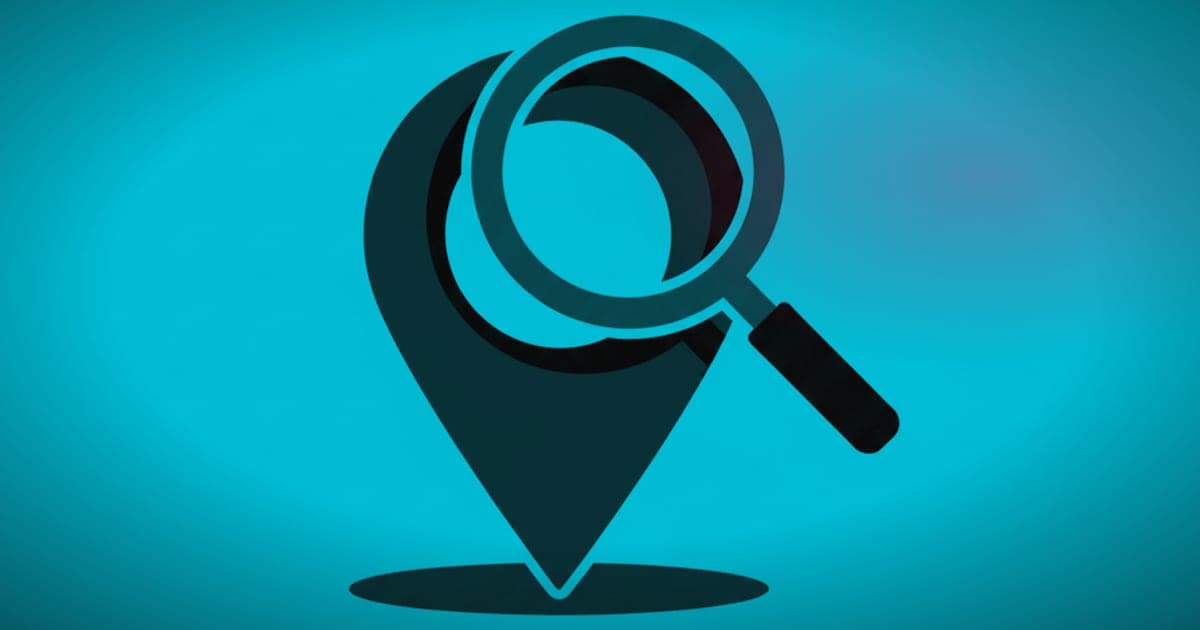 Location pin with magnifying glass overlay