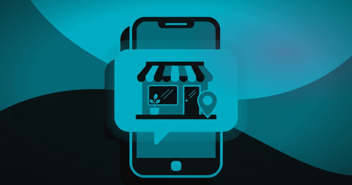 A speech bubble rising from a phone with a storefront icon inside it